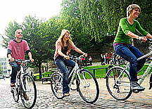 Three people on bicycles at the NTU Ucycle launch
