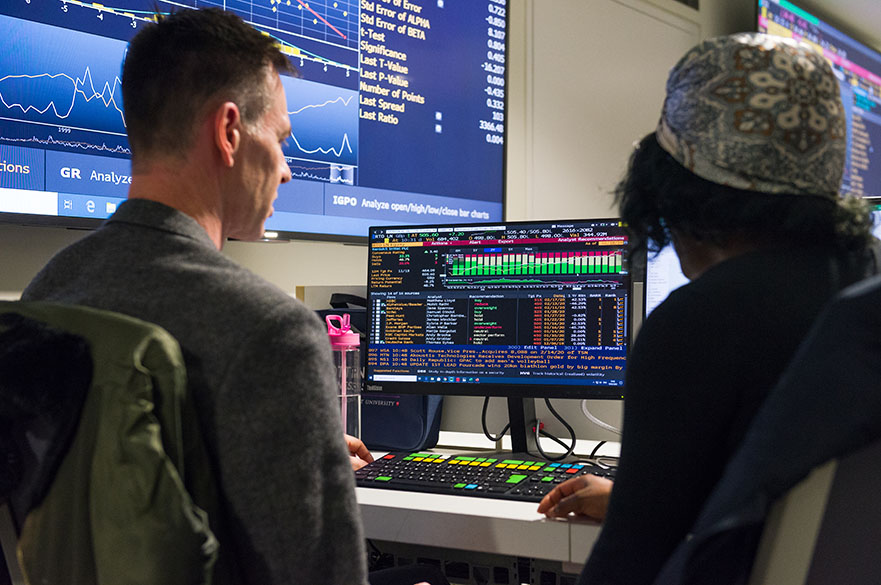 Student working on the Bloomberg terminals in the Nottingham Business School Business Lab on the City Campus at Nottingham Trent University