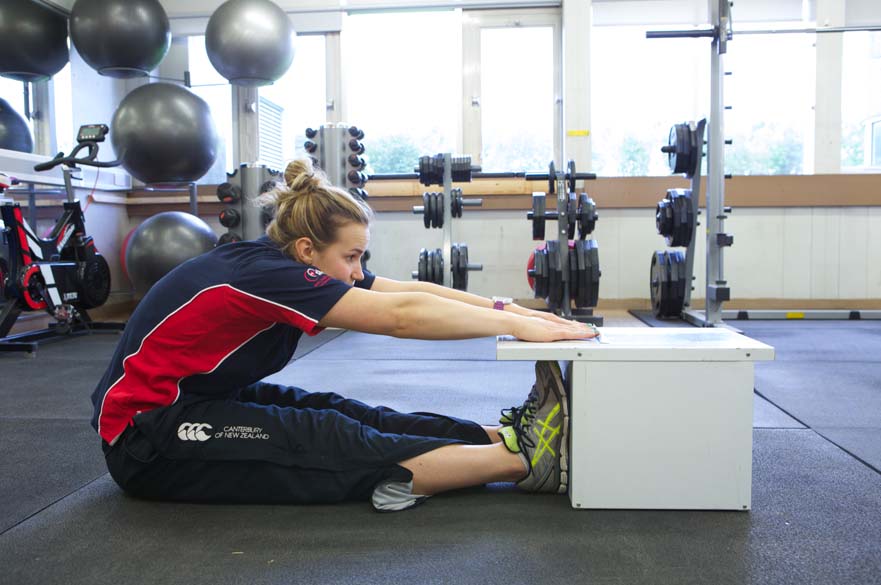 Student doing exercise in the gym