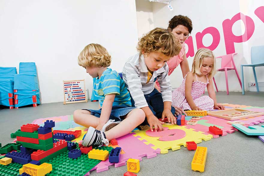 Children playing with building blocks