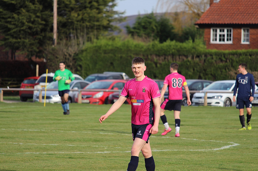 Student on football field