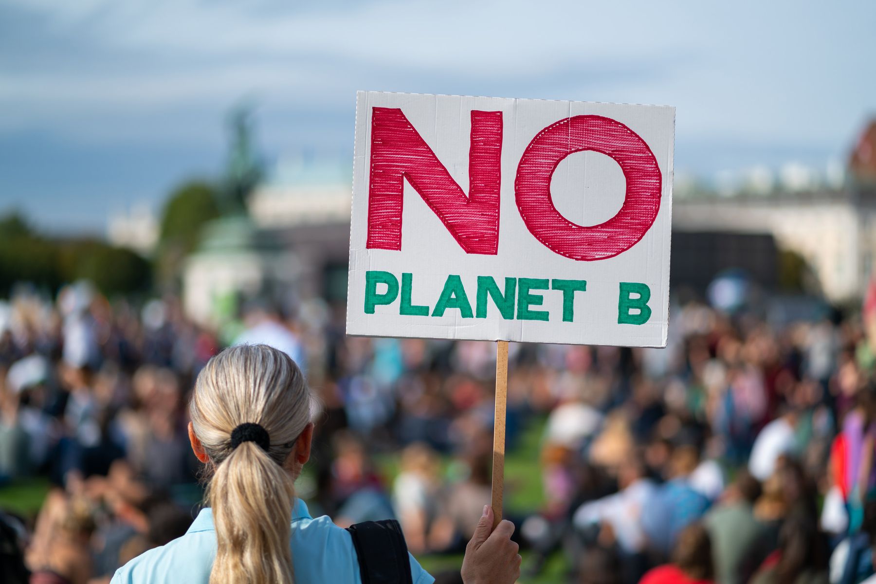 Protester holding no planet B sign