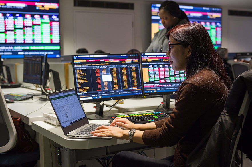 Student working on the Bloomberg terminals in the Nottingham Business School Business Lab on the City Campus at Nottingham Trent University