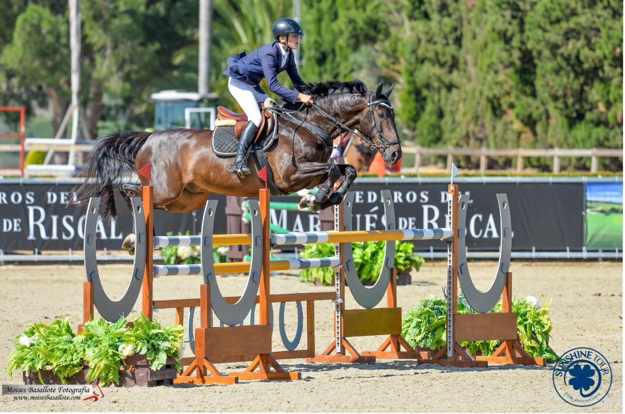 FE equine student, Harry Capena, standing with horse