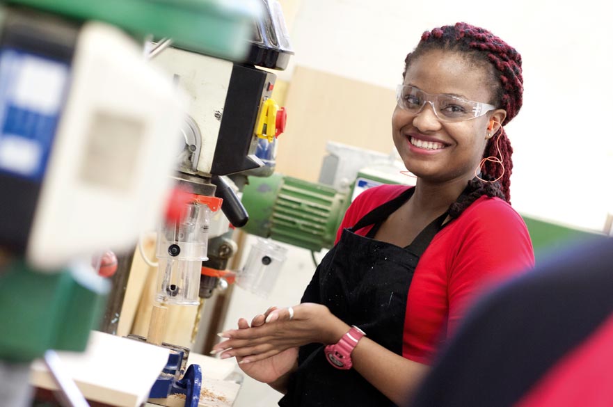 Doctoral student using machinery