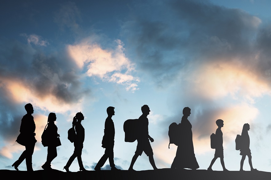 Silhouettes of people walking