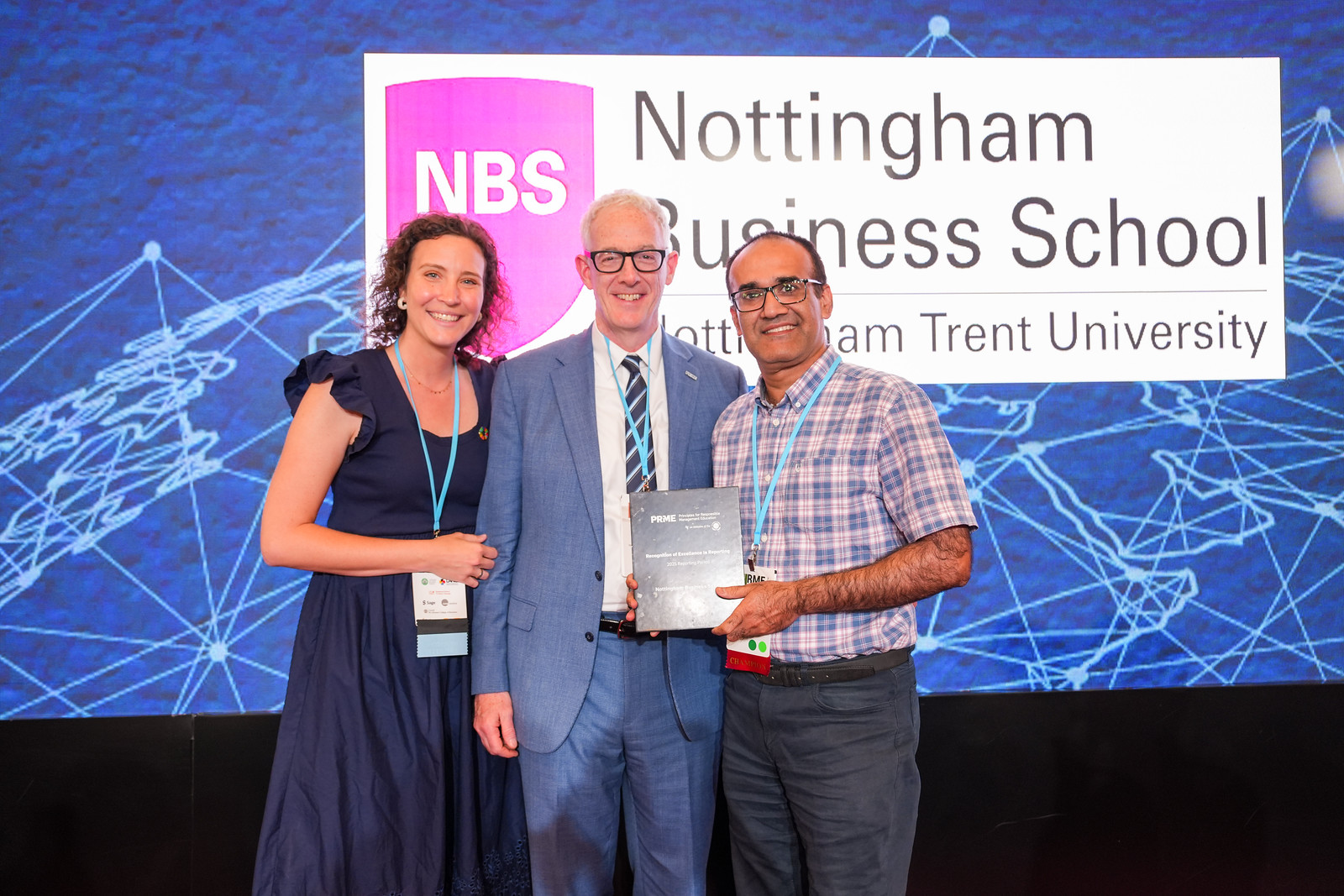 Muhammad Mazhar accepts the award on behalf of Nottingham Business School