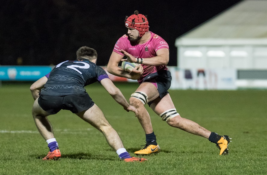 NTU Men's Rugby Union Player Scott Hall carrying the ball