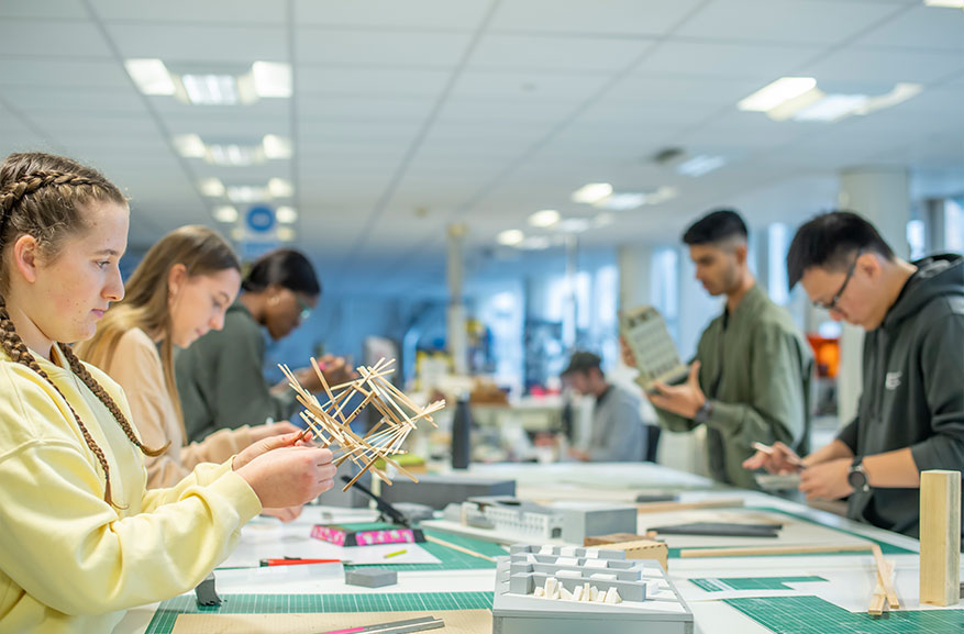 Architecture students working in the model making workshop in the Maudslay building on the City Campus