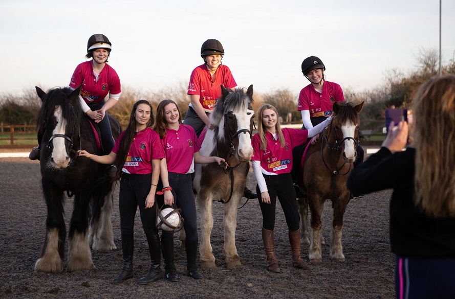 Equestrian team with horses