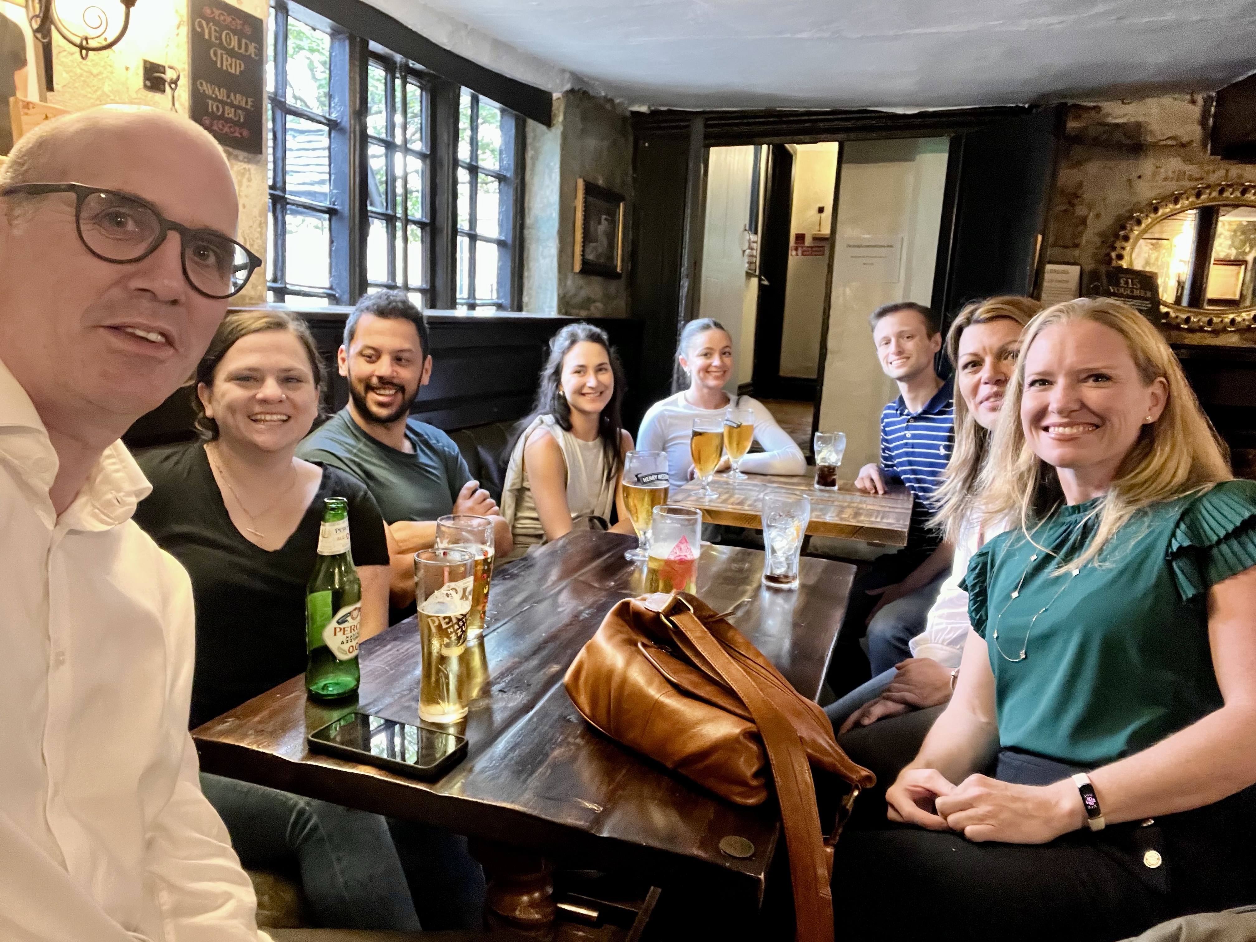 Students at the pub with their professor