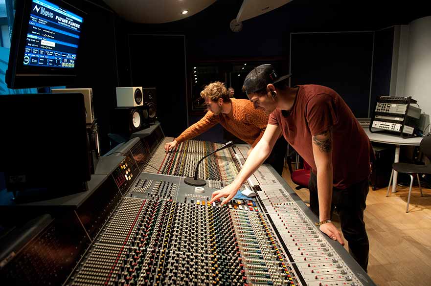 Students working in sound studio