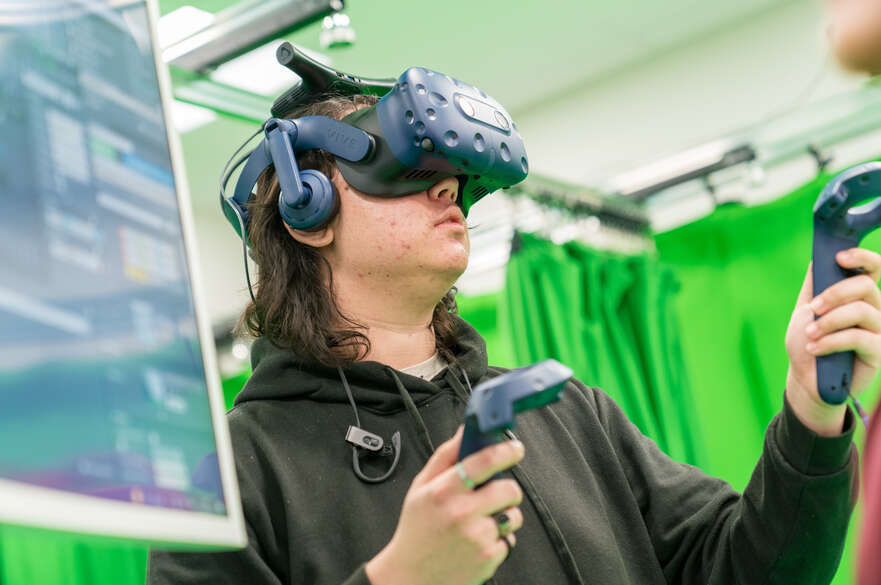  Student testing VR Set in Virtual Reality Lab