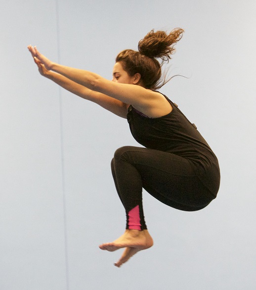 student trampolining