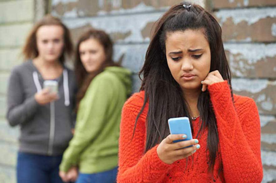 Girl being cyberbullied