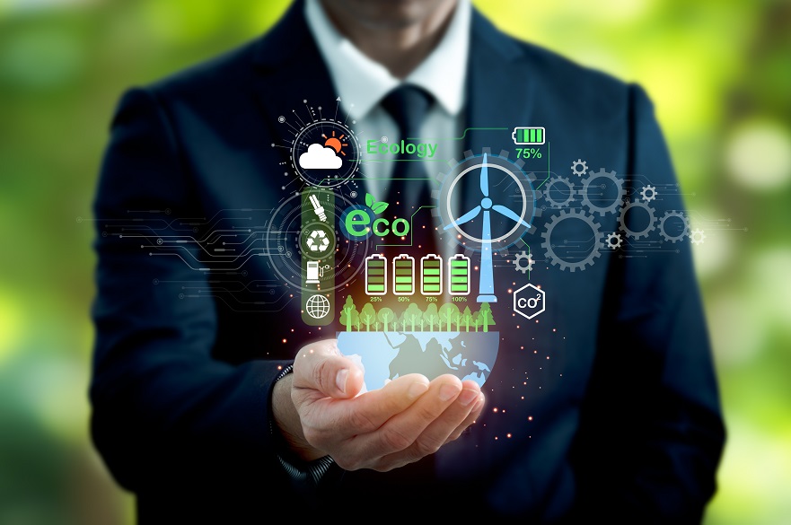 Man in a suit with icons of sustainability and eco business in his palm