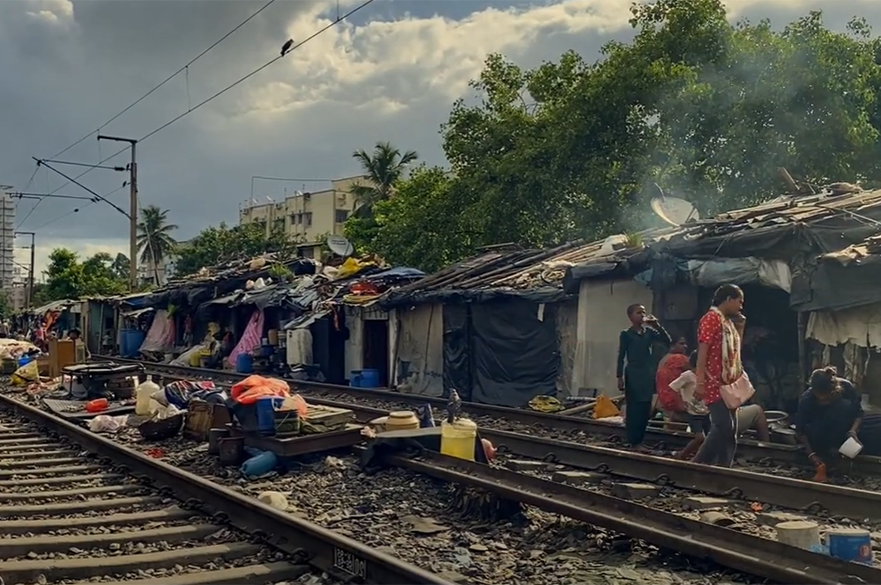 People living on train tracks in Calcutta