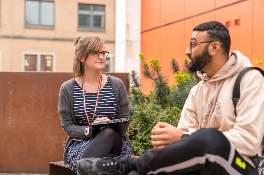 A student talking to a Student Accommodation Support Officer