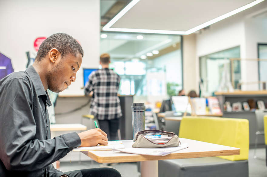 Student working at a table