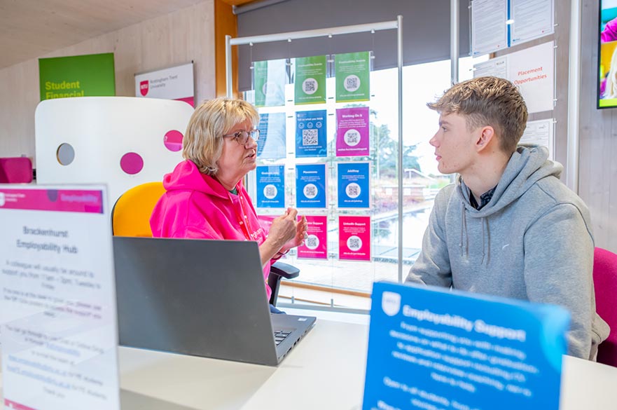 A student being advised by a member of staff in the Employability Hub at Brackenhurst.
