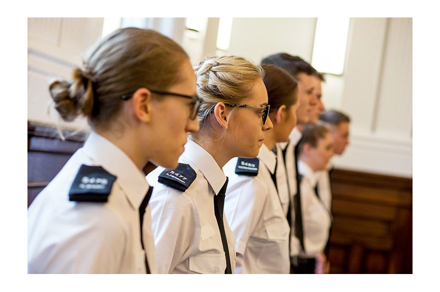 Line of young police trainees in uniform