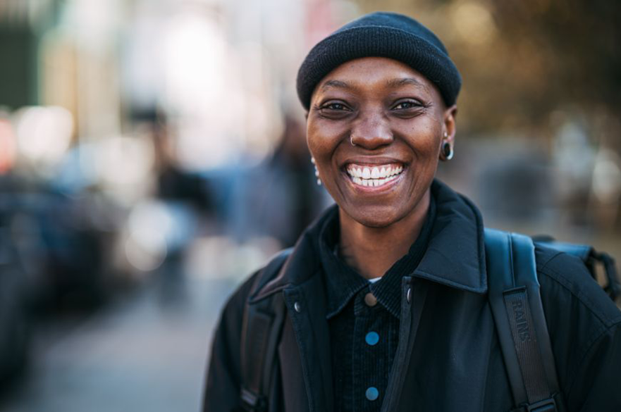 A student smiles to camera