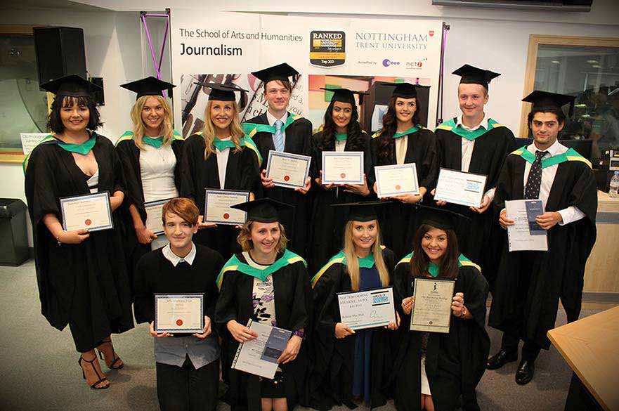 Journalism students with prize certificates