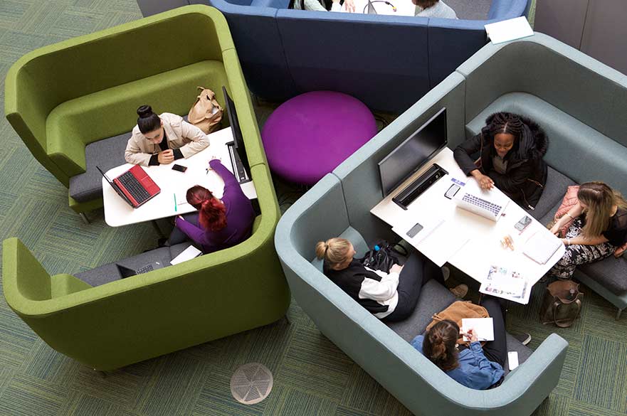Birds eye view of students working at a table