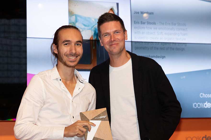 Joe receiving his award at 100% Design