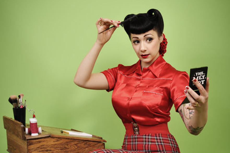 A female putting makeup on.