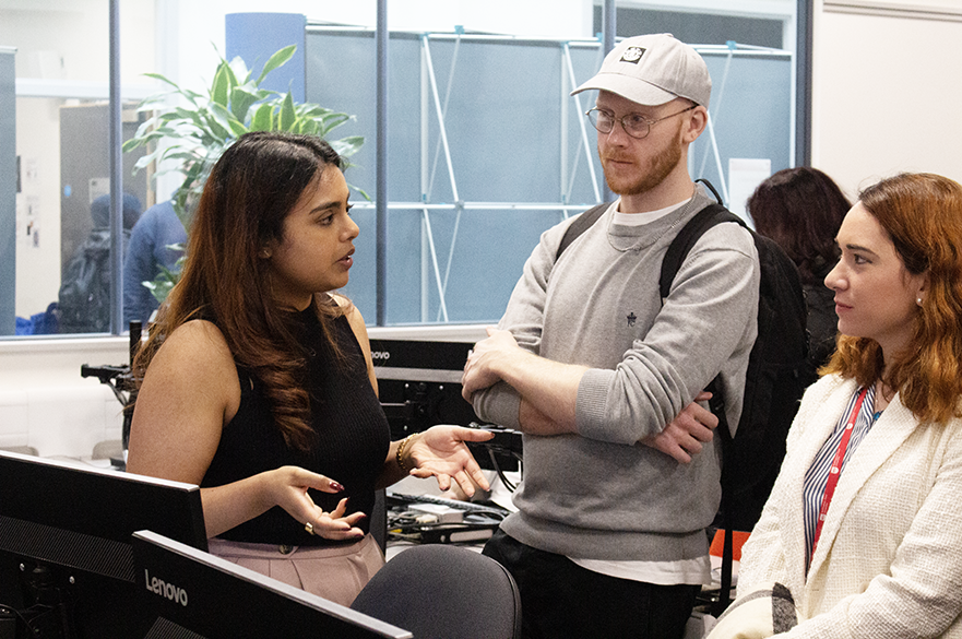 Industry leader giving feedback on student's project