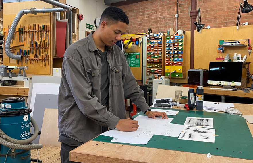 Luke working in his workshop