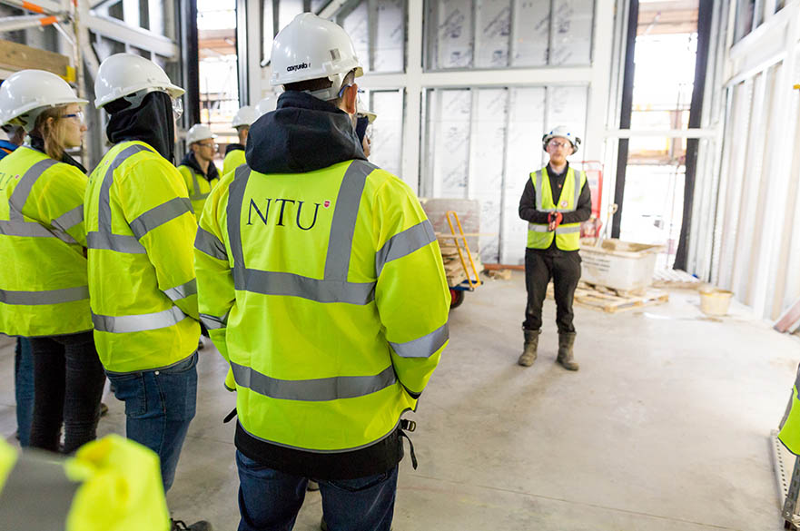 Construction students on site with Interserve