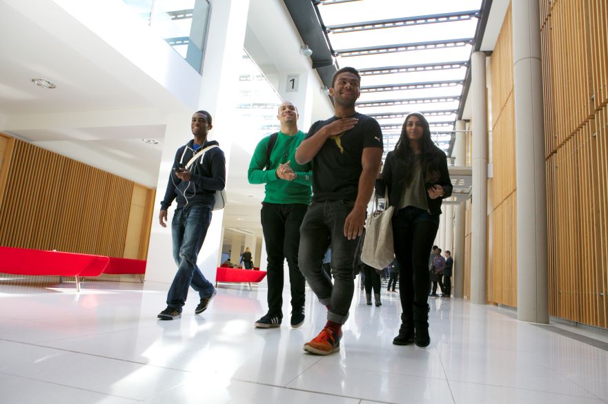 Students in Newton building