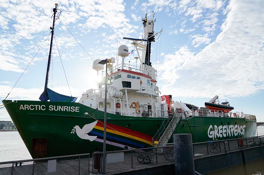 Greenpeace logo sign on boat vessel the Arctic Sunrise in Bordeaux harbour France