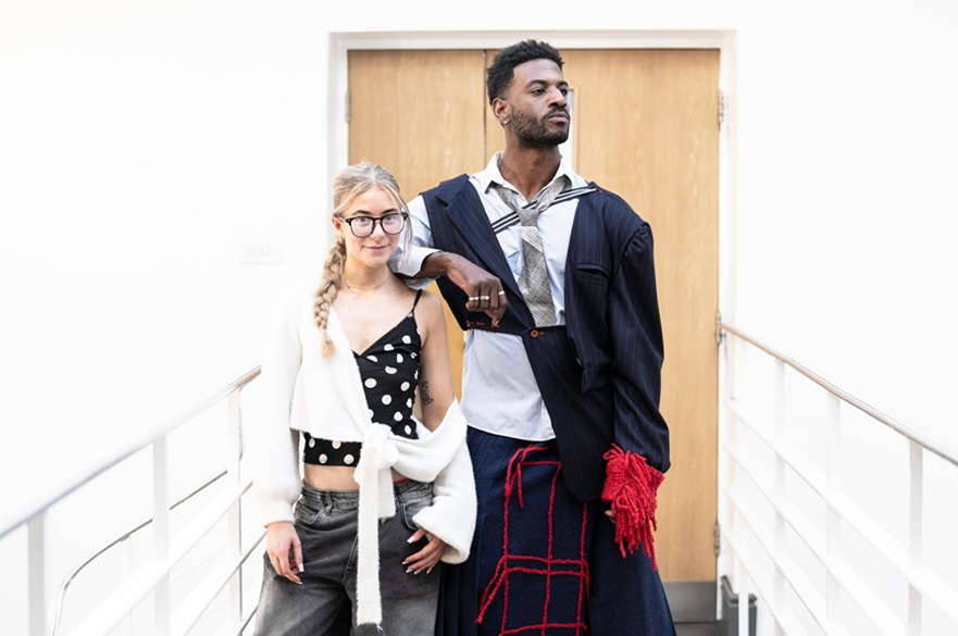 Katie with a model posing in one of her skirts