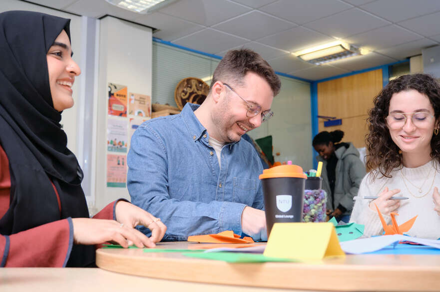 Students enjoying activities at the Global Lounge