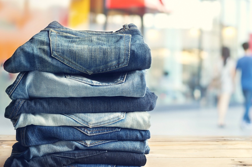 An image of pairs of jeans