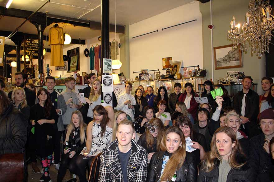 Students at art auction in The Hopkinson gallery