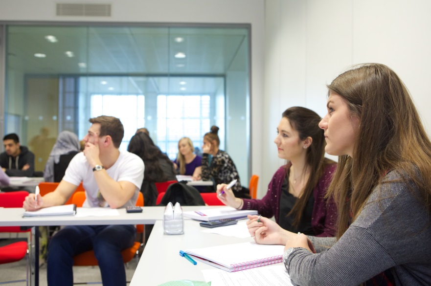 Students sat at desks in classroom