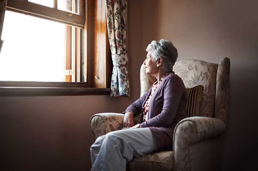 Lady looking out of window