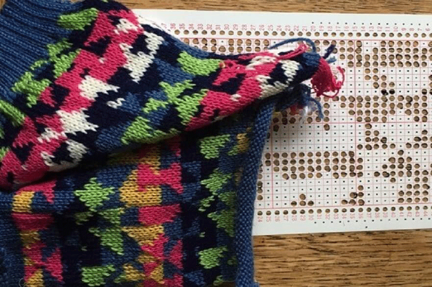 an image of punch cards used in domestic machine knitting