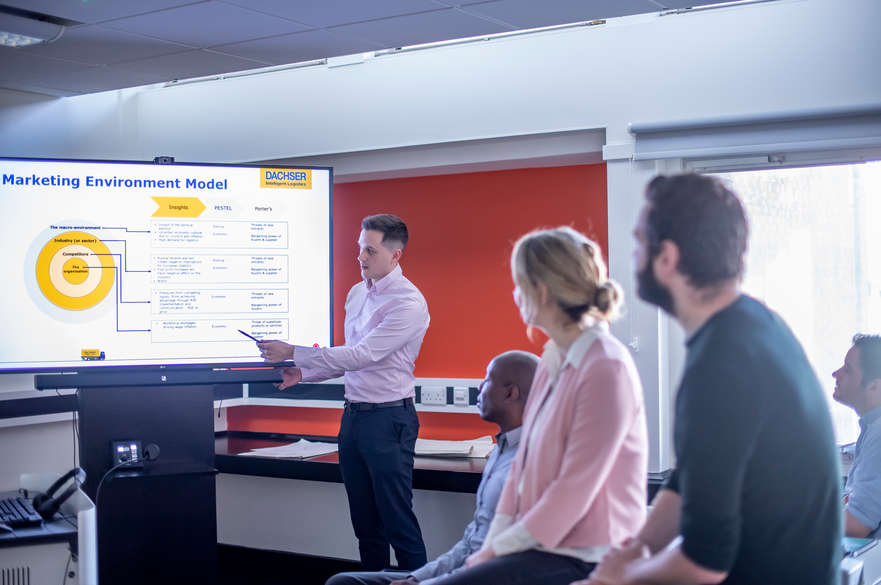 student presenting to group