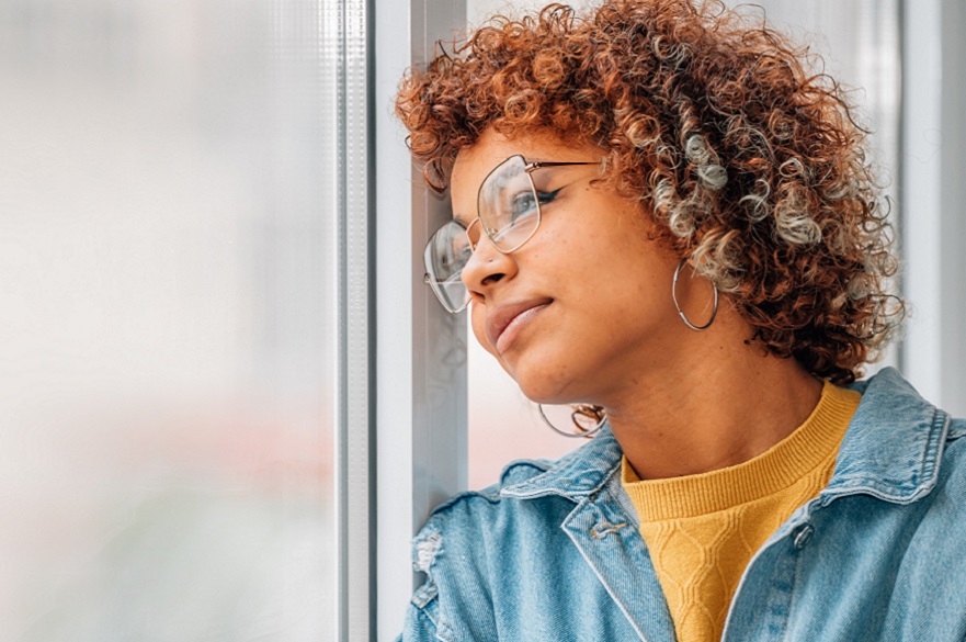 Person looking out of a window