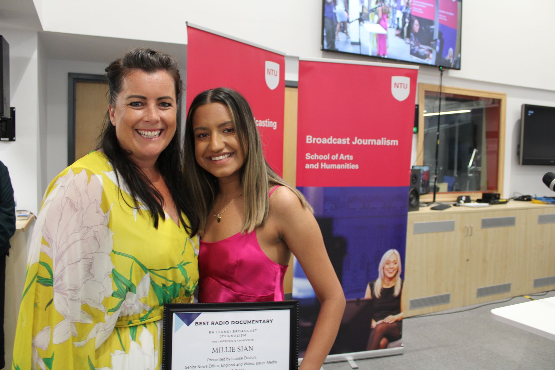 Course tutor Jannah Robinson, on behalf of Louise Easton, senior news editor across England and Wales for Bauer Media, presenting to Millie Sian