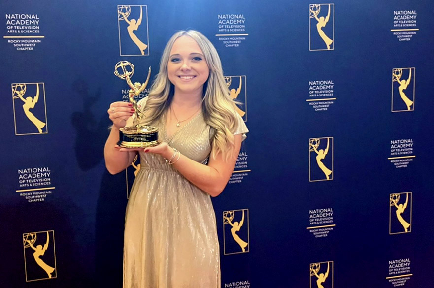 Stephanie Bennett receiving her Emmy Award
