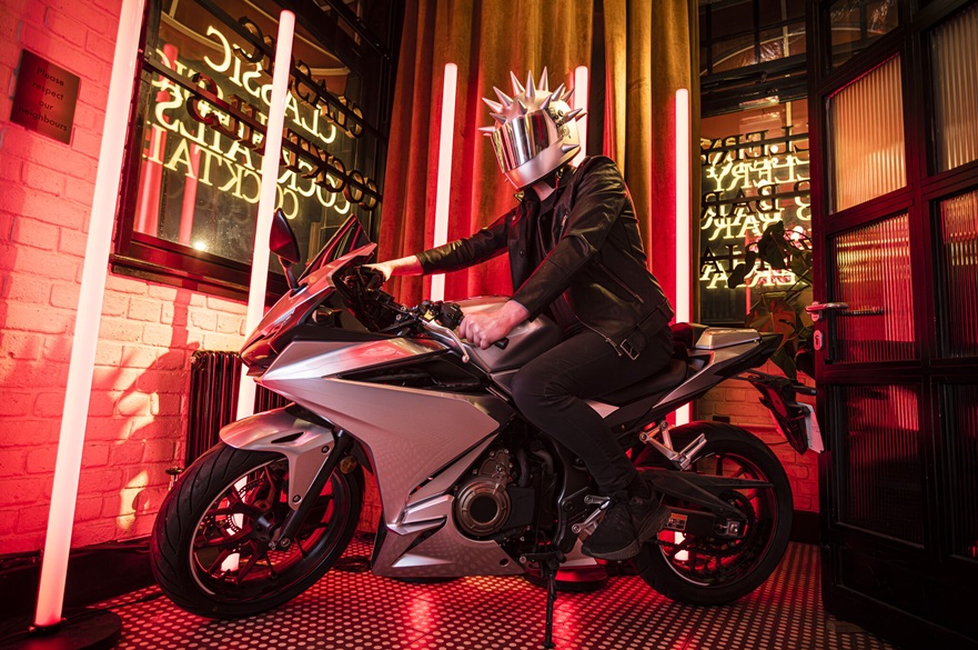 A motorbike with its rider.
