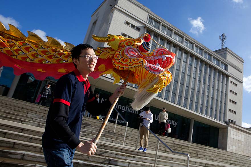 Student with Chinese dragon
