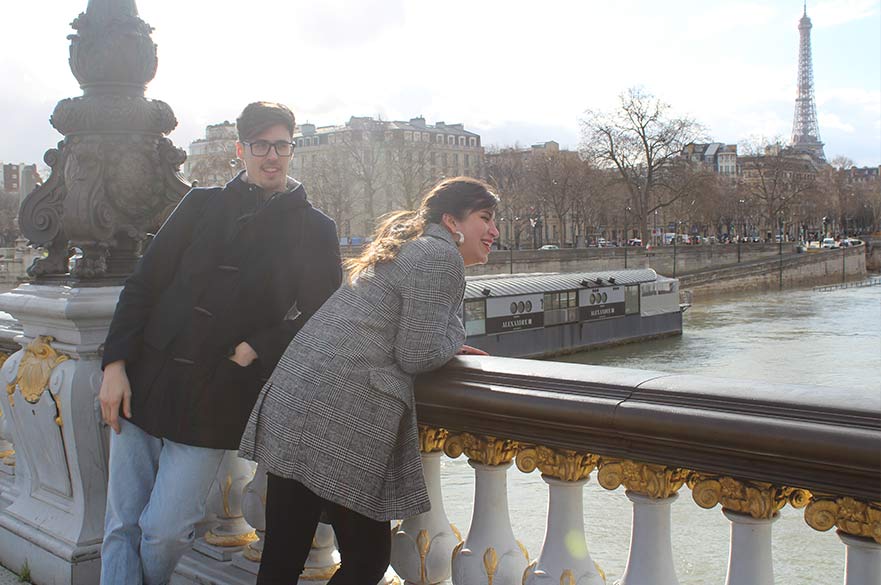 Students looking out onto the River Seine