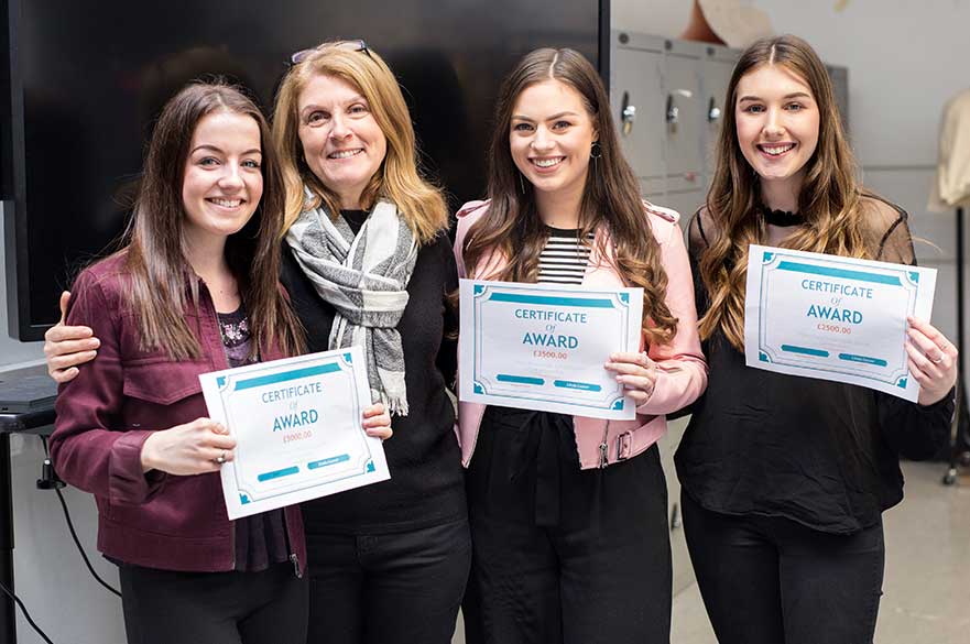 Linda with the winning students